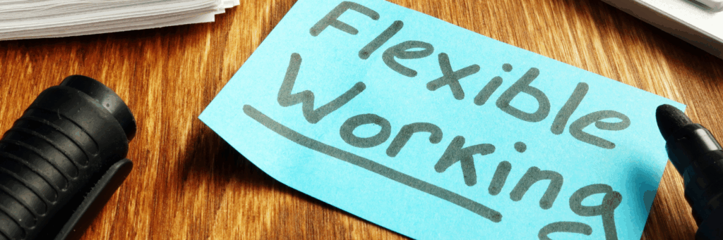 flexible working written on a blue piece of paper on a desk