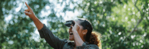 lady looking through binoculars